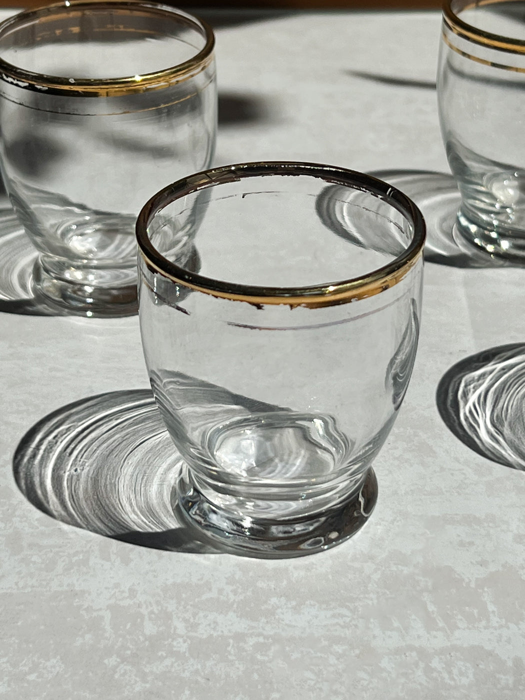 Set Of 4 Gold Rimmed Shot Glasses